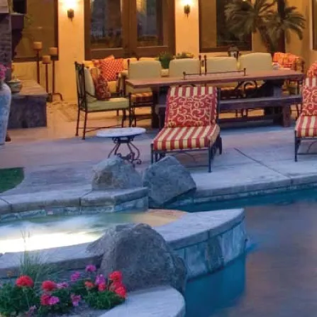 Custom free form gunite pool with natural stone edge in Houston